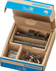 Pastillas de freno de disco Shimano G05A-RX con resorte (compuesto de resina, placa trasera de aleación, caja/25 pares)