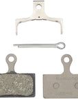 Pastillas de freno de disco Shimano G05S-RX con resorte (compuesto de resina, placa trasera de acero inoxidable, caja/25 pares)