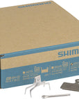 Pastillas de freno de disco Shimano G05S-RX con resorte (compuesto de resina, placa trasera de acero inoxidable, caja/25 pares)
