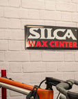 Letrero del centro de cera Silca