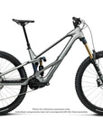 A full-suspension mountain bike with a metallic gray frame, black knobby tires, a black saddle, and gold front fork accents, shown against a plain white background.