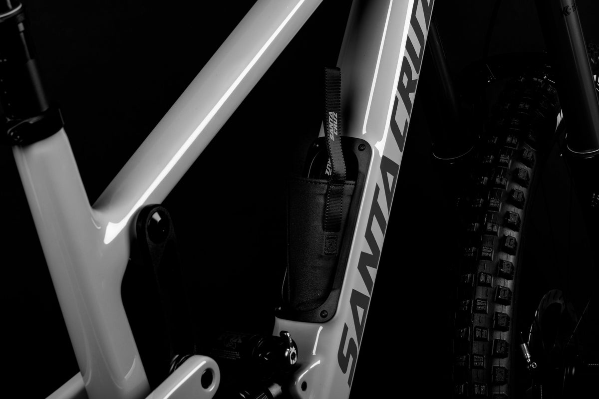 Santa Cruz Nomad Glovebox V2 downtube storage open with tool wallet
