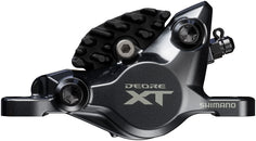 Pinza de freno de disco Shimano Deore XT BR-M8200 XC (delantera y trasera, montaje en poste, 2 pistones, incluye pastillas metálicas con aletas J04C-MF, color negro)