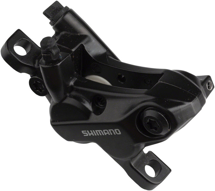 Pinza de freno de disco Shimano BR-MT520 de 4 pistones con pastillas metálicas delanteras y traseras negras