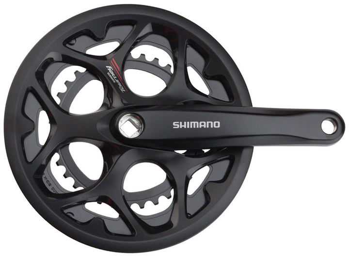 Juego de bielas Shimano Tourney FC-A070 (170 mm, 7/8 velocidades, 50/34 dientes, cono cuadrado remachado, interfaz JIS, negro, con protector de cadena)