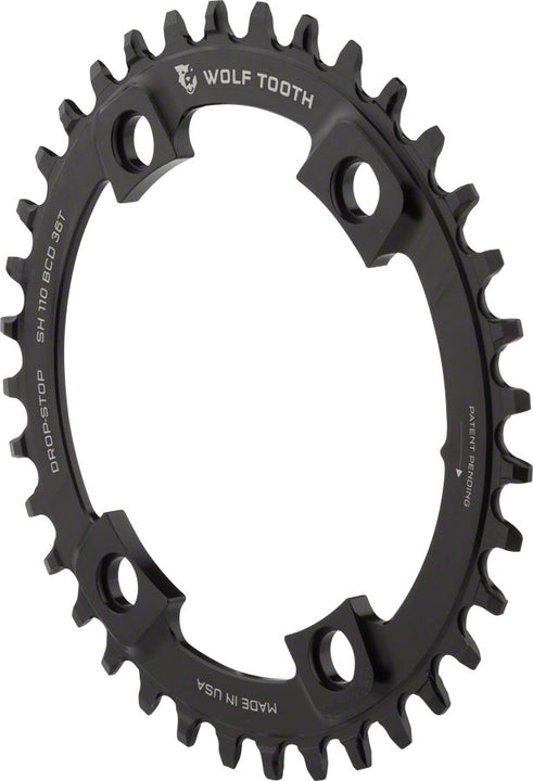 Plato Wolf Tooth Shimano 110 BCD asimétrico - 36 dientes, 110 BCD asimétrico, 4 tornillos, tope de caída para bielas Shimano (negro)