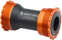 Eje de pedalier Wolf Tooth T47 (interior, 85,5/92 mm, eje de 24 mm), color naranja
