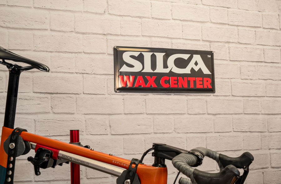 Letrero del centro de cera Silca
