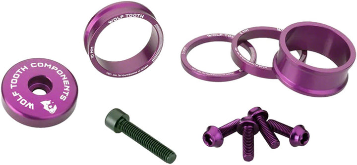 Kit de accesorios para auriculares Wolf Tooth BlingKit: espaciadores de 3, 5, 10 y 15 mm, tapa superior, espaciador integrado de 5 mm, color morado ultravioleta